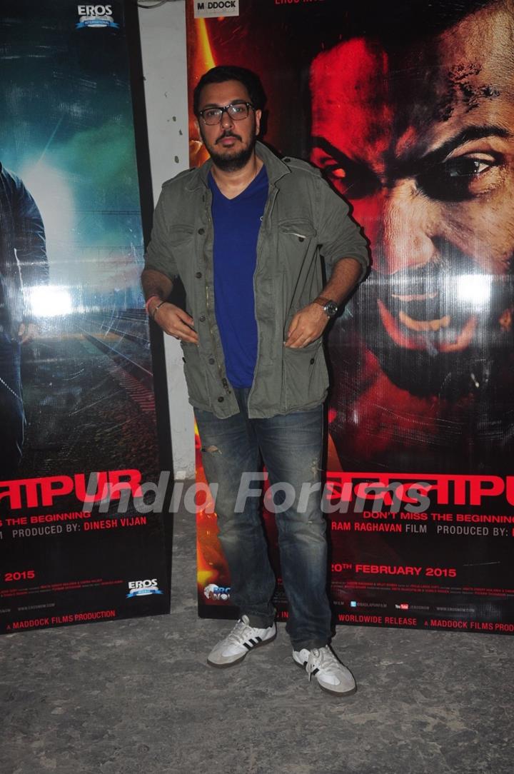 Dinesh Vijan poses for the media at the Promotions of Badlapur