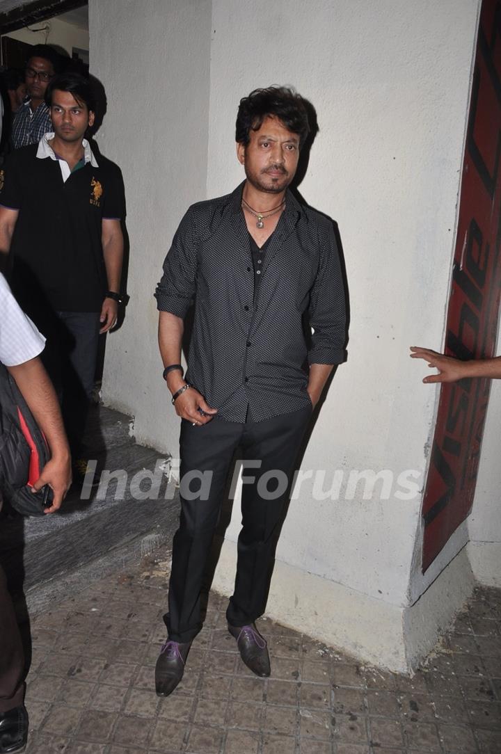 Irrfan Khan poses for the media at the Special Screening of Shamitabh