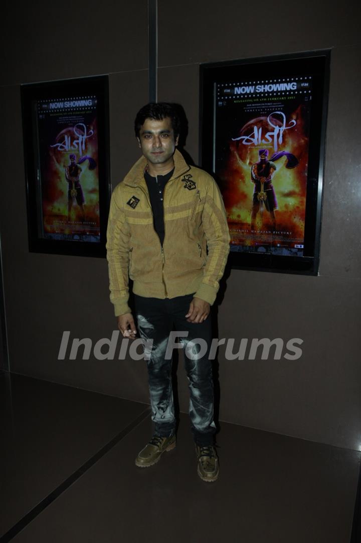 Santosh Juvekar poses for the media at the Premier of Marathi Movie Baji