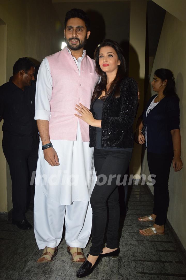 Abhishek Bachchan and Aishwarya Rai Bachchan pose for the media at Special Screening of Shamitabh