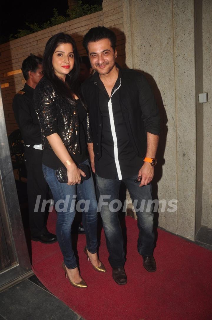 Sanjay Kapoor poses with wife at the Success Bash of Queen