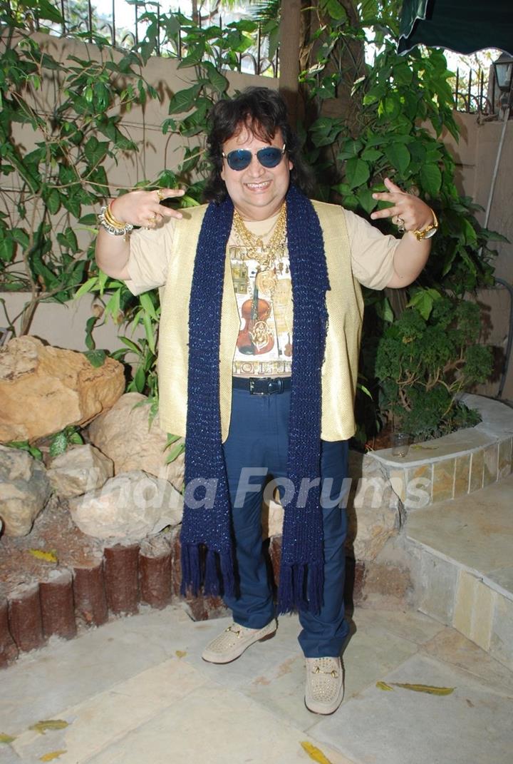 Bappi Lahiri poses for the media