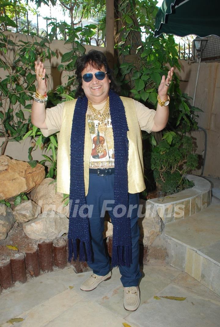 Bappi Lahiri poses for the media