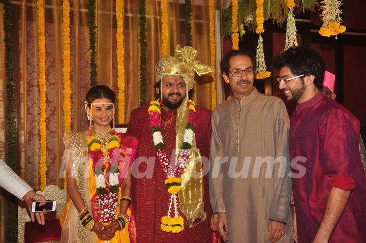 Uddhav Thackeray and Aditya Thackeray pose with the Wedding Couple Rahul and Aditi Thackeray