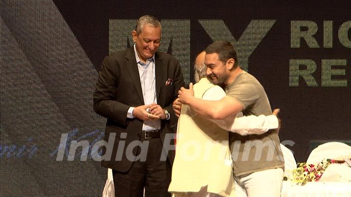 Aamir Khan greets a guest at YFG Event