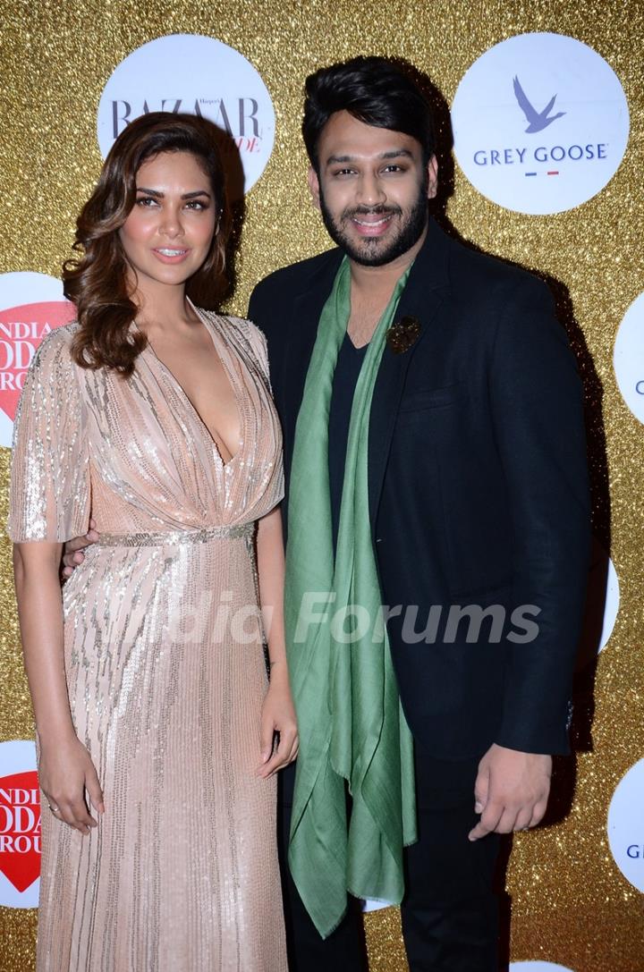 Esha Gupta poses with a guest at Harper's Bazaar Bride Anniversary Bash