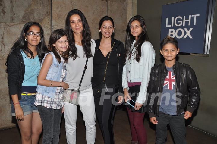 Mehr Jesia Rampal poses with children at the Special Screening of Roy