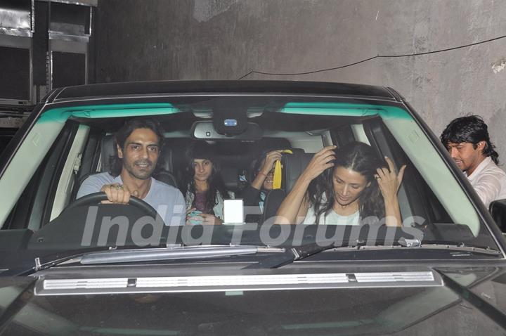 Arjun Rampal was snapped driving his car at the Special Screening of Roy