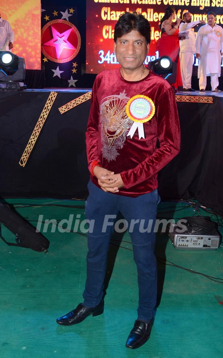 Raju Shrivastav poses for the media at the Annual Day of Children's Welfare Centre High School