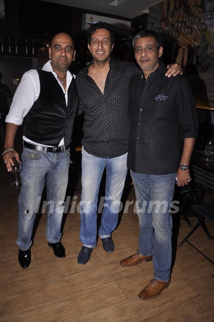 Sulaiman Merchant poses with friends at Cafe D'WINE