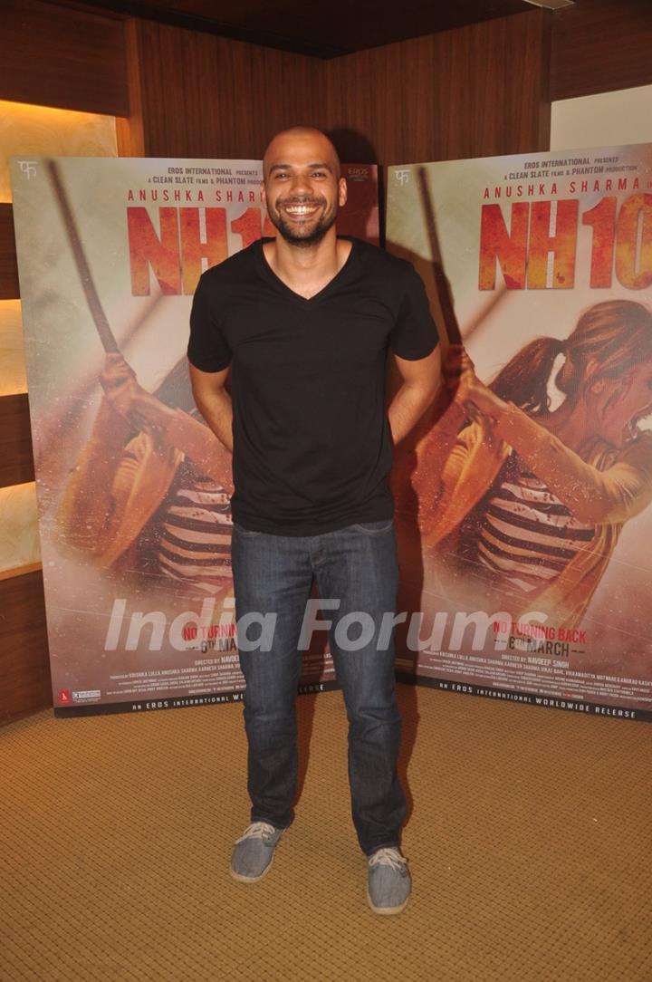 Neil Bhoopalam poses for the media at the Promotions of NH10