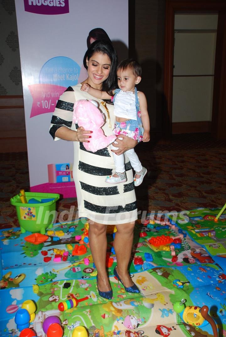 Kajol was snapped playing with a kid at Huggies Event