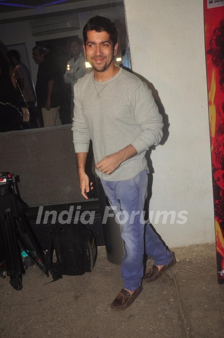 Rohit Dhawan poses for the media at the Special Screening of Badlapur