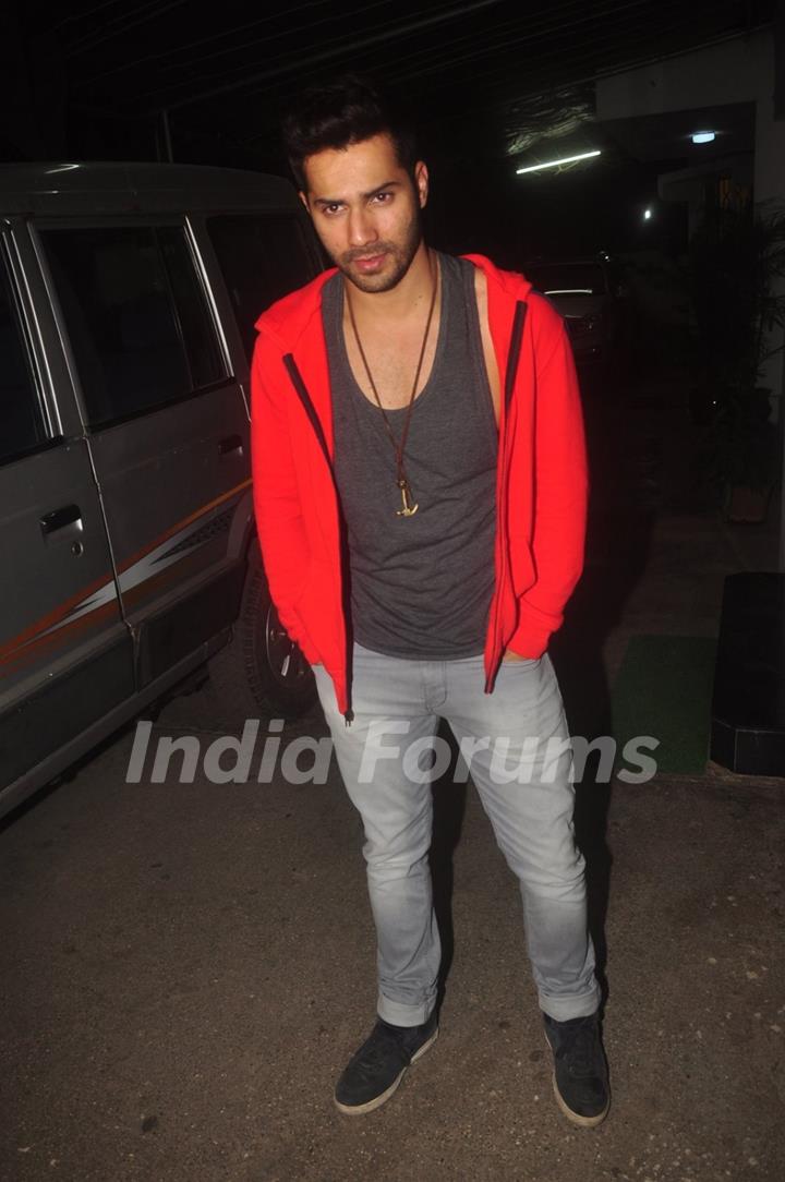 Varun Dhawan poses for the media at the Special Screening of Badlapur