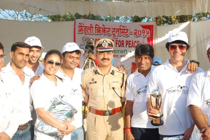 Celebs pose for the media at Cricket for Peace