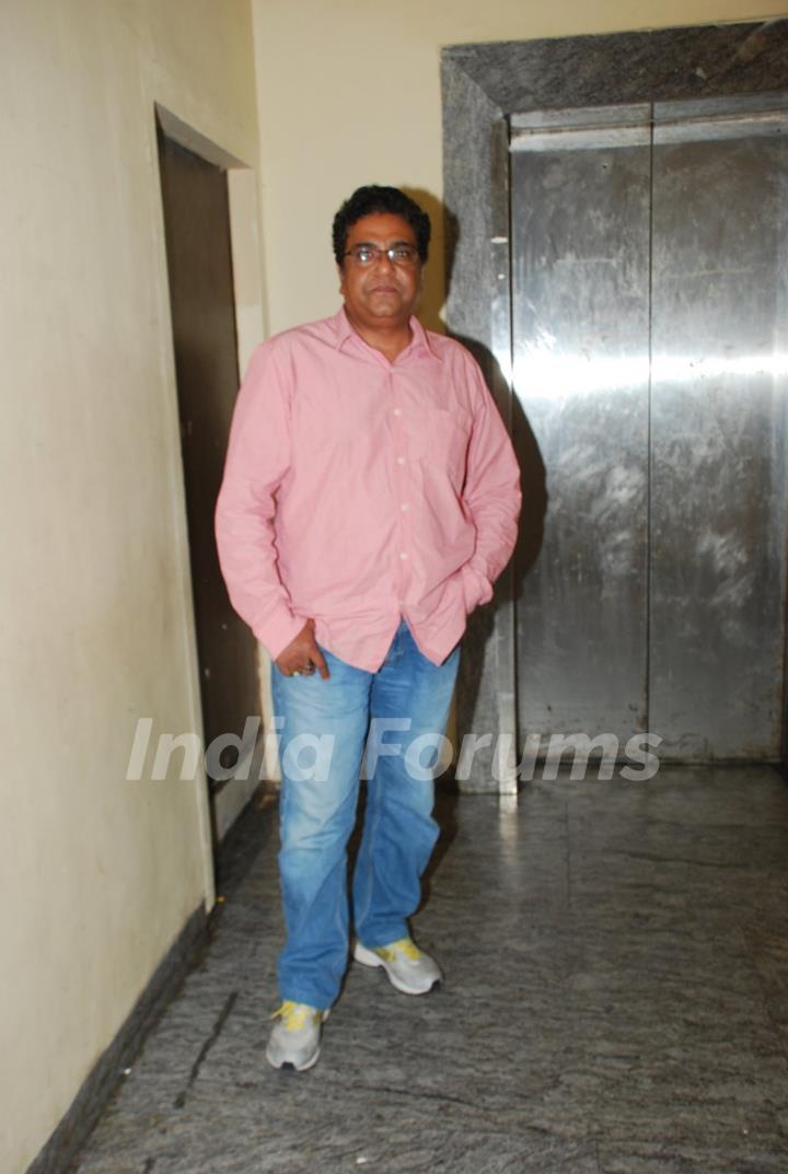 Zakir Hussain poses for the media at the Special Screening of Badlapur