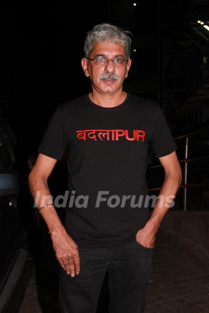 Sriram Raghavan poses for the media at the Special Screening of Badlapur