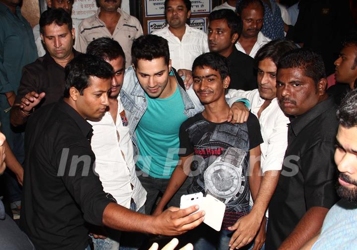 Varun Dhawan clicks a selfie with his fans at Gaiety Galaxy