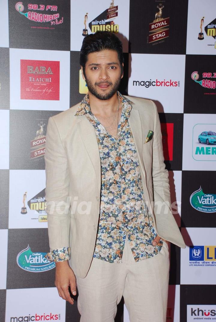 Ali Fazal poses for the media at Radio Mirchi Awards