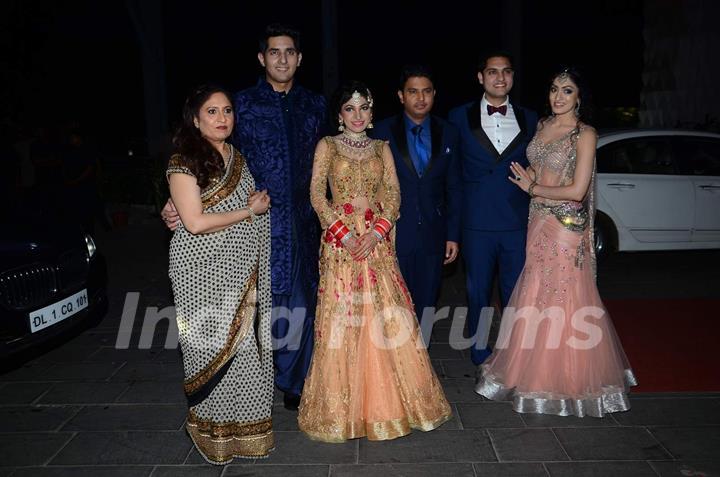 Tulsi Kumar poses with her family members at her Wedding Reception