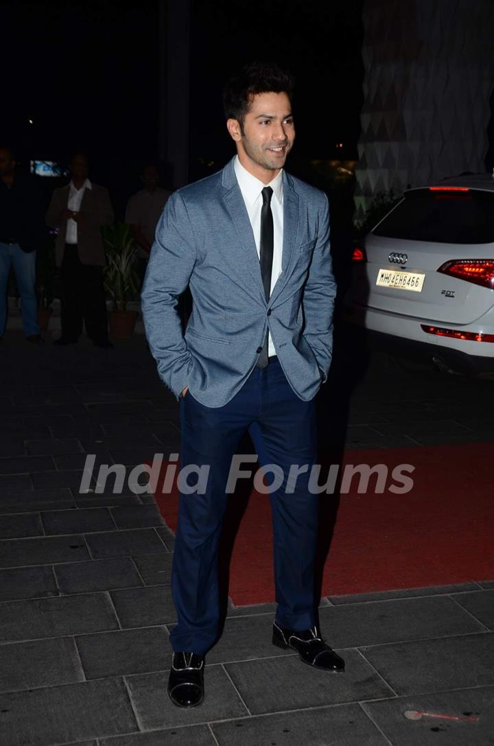 Varun Dhawan poses for the media at Tulsi Kumar's Wedding Reception