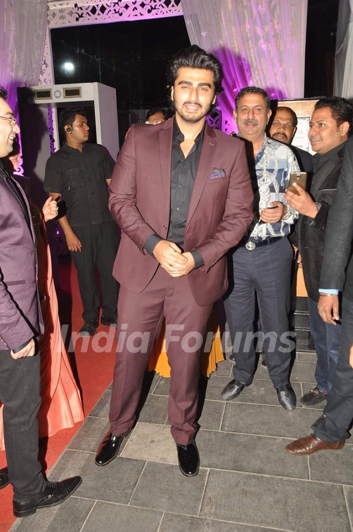 Arjun Kapoor poses for the media at Tulsi Kumar's Wedding Reception