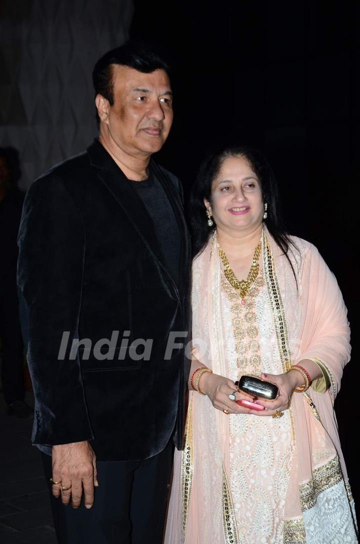 Anu Malik poses with wife at Tulsi Kumar's Wedding Reception