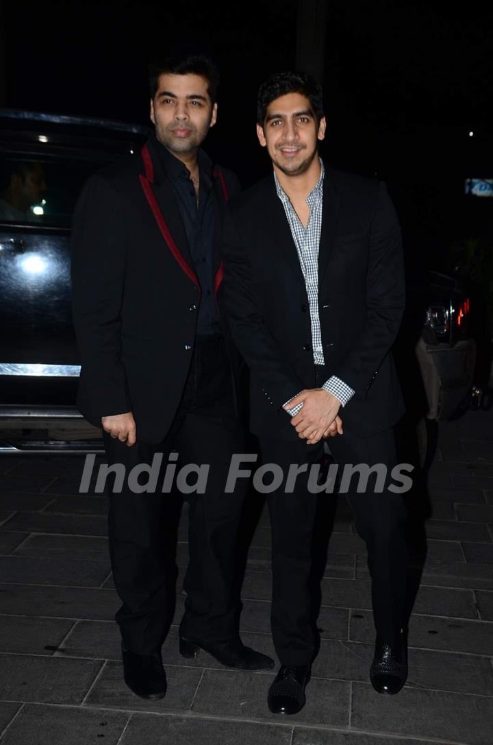 Karan Johar and Ayan Mukerji pose for the media at Tulsi Kumar's Wedding Reception