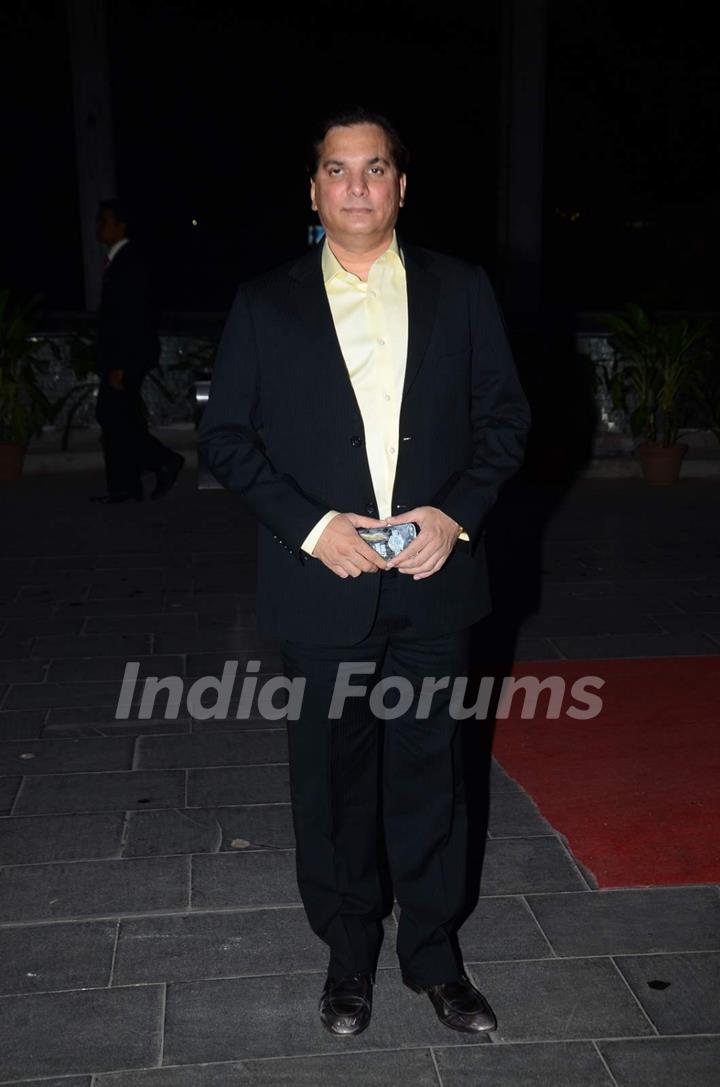 Lalit Pandit poses for the media at Tulsi Kumar's Wedding Reception