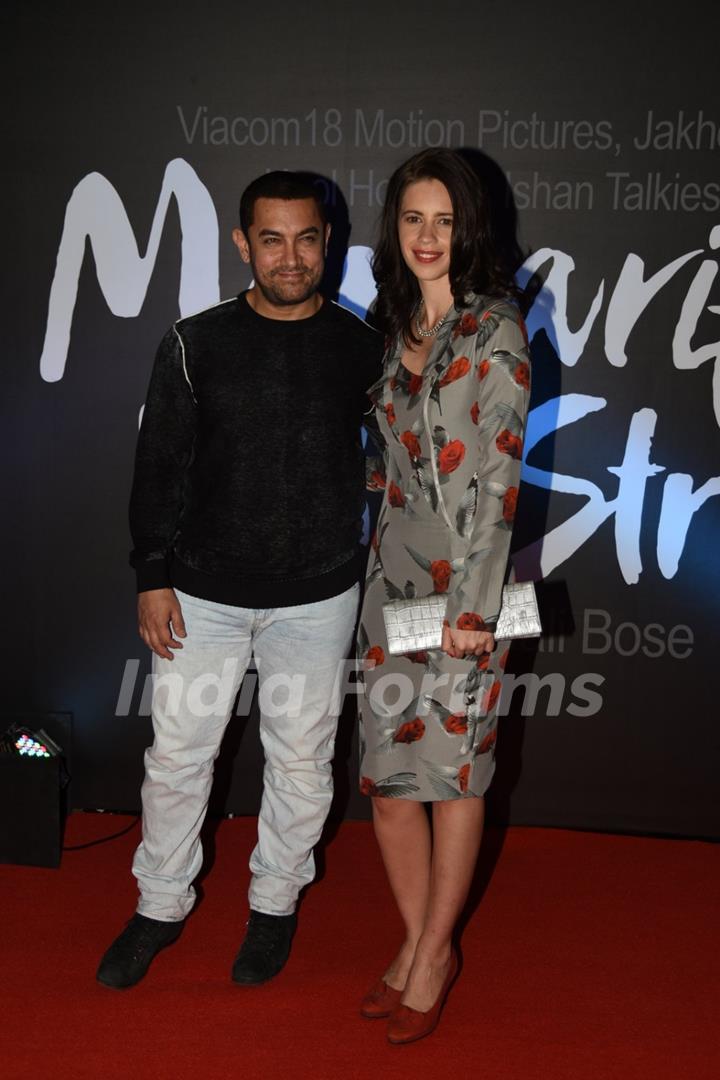 Aamir Khan and Kalki Koechlin pose for the media at the Trailer Launch of Margarita, with a Straw