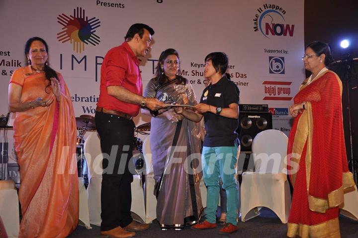 Anu Malik presents an award at IMC Ladies Wing Event