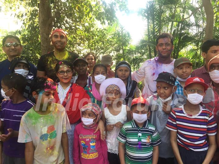 Sandip Soparkar poses with Cancer Patient Children