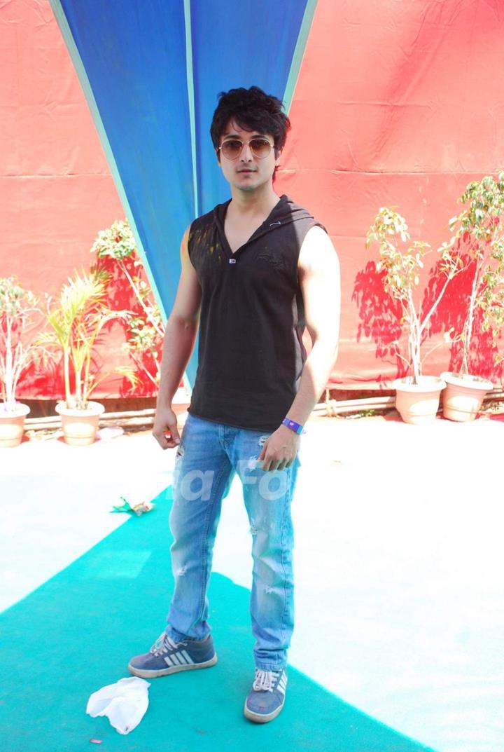 Rohan Mehra poses for the media at Holi Celebrations