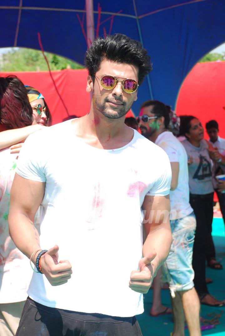 Kushal Tandon poses for the media at Holi Celebrations