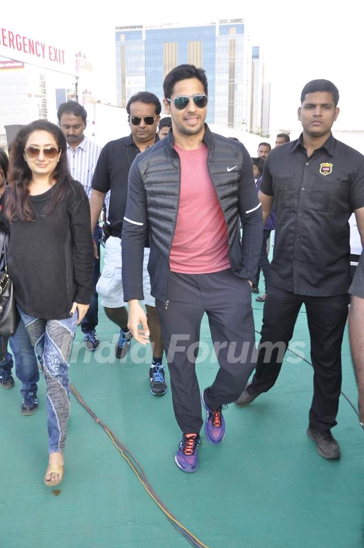 Sidharth Malhotra poses for the media at DNA Race