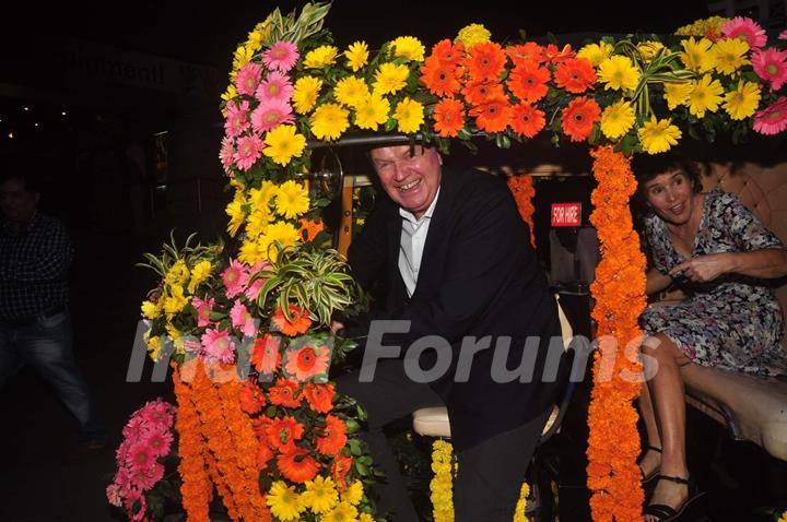 Celebs arrive in a decorated auto at the Special Screening of The Second Best Marigold Hotel