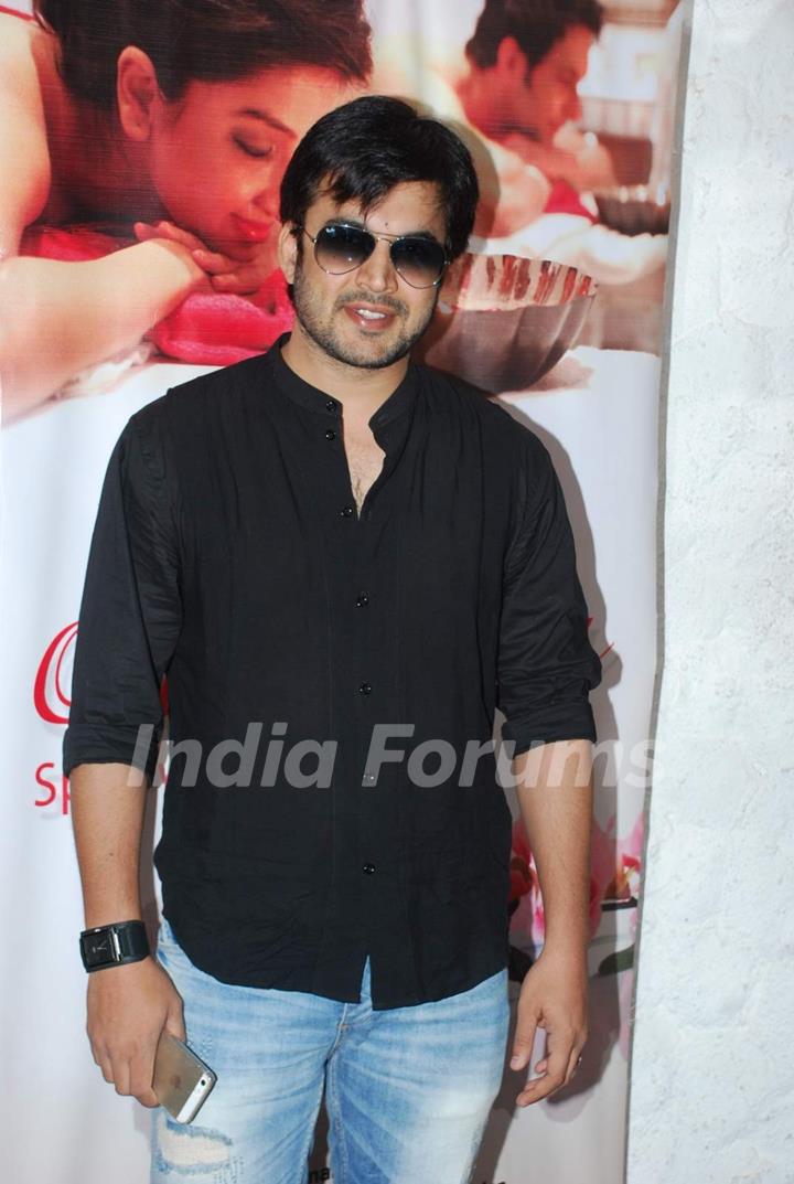 Ajay Chaudhary poses for the media at Charisma Spa