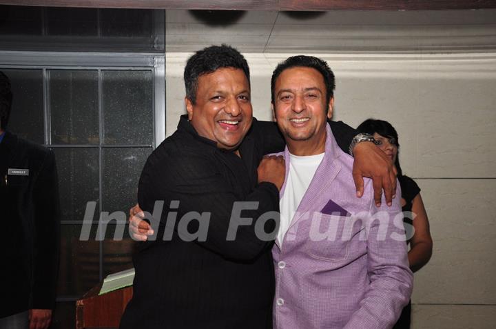 Gulshan Grover and Sanjay Gupta pose for the media at the Launch of Harry's Bar & Cafe