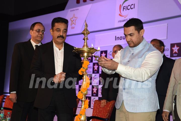 Aamir Khan lights the lamp at FICCI Frames 2015 Inaugural Session