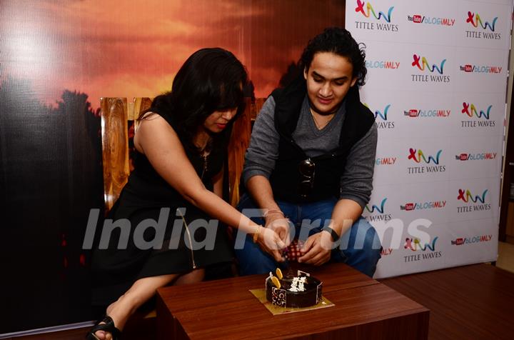 Faisal Khan cuts a cake at Book Signing Event