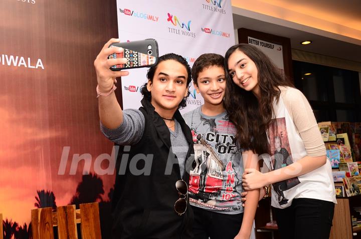 Faisal Khan clicks a selfie with fans at Book Signing Event