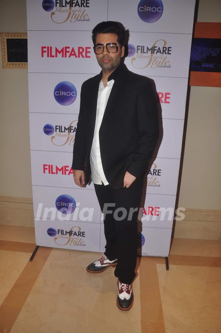 Karan Johar poses for the media at the Cover Launch of Ciroc Filmfare Glamour & Style Awards Issue