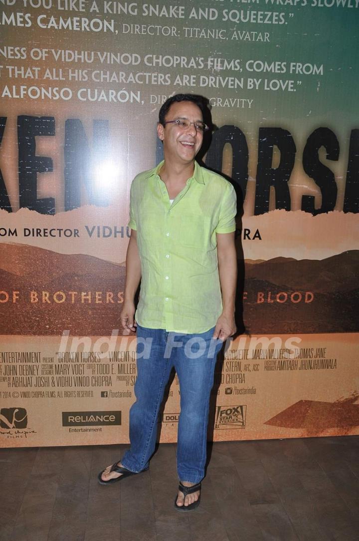 Vidhu Vinod Chopra poses for the media at the Special Screening of Broken Horses
