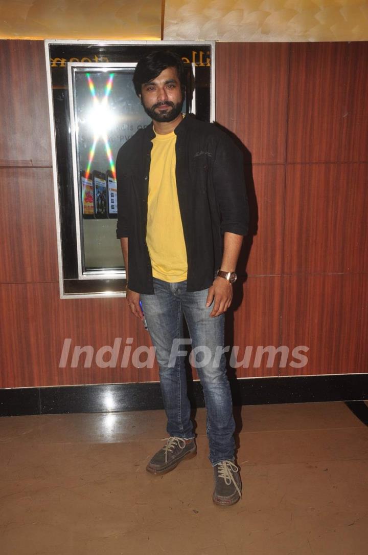 Santosh Juvekar poses for the media at the Premier of Coffee Aani Barach Kahi