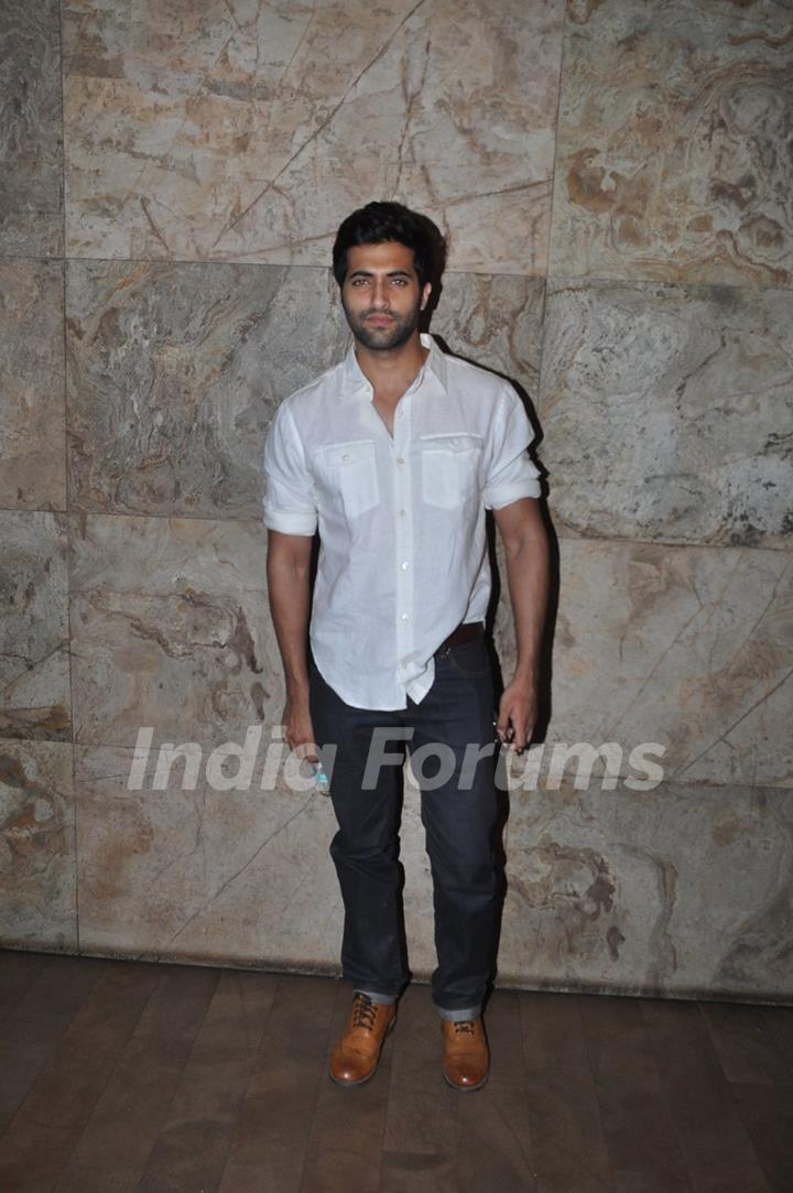Akshay Oberoi poses for the media at the Special Screening of Detective Byomkesh Bakshy!