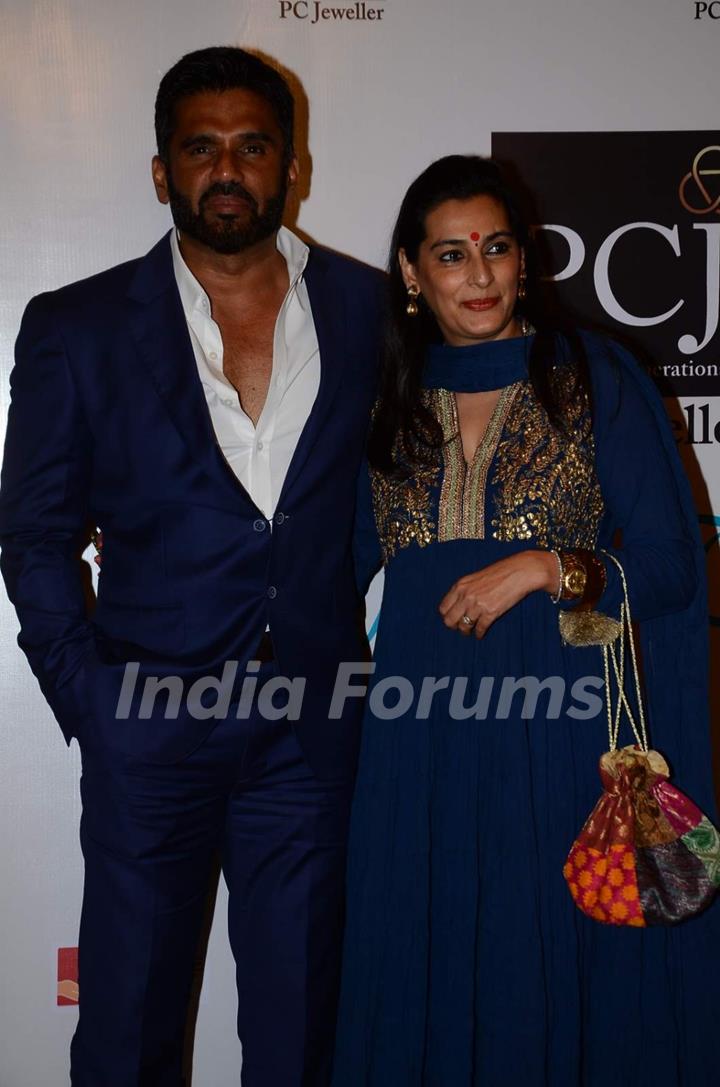 Suniel Shetty and Mana Shetty pose for the media at the Red Carpet of 'Mijwan-The Legacy'