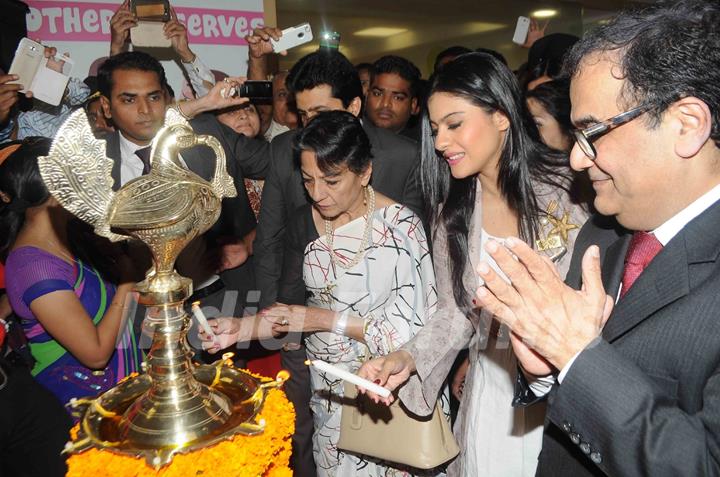 Tanuja lights the lamp at the Inauguration of Surya Mother & Child Care Hospital