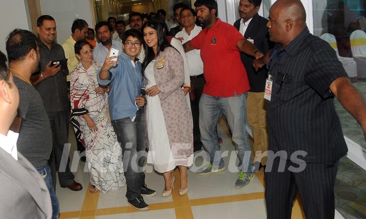 Kajol clicks a selfie with a fan at the Inauguration of Surya Mother & Child Care Hospital