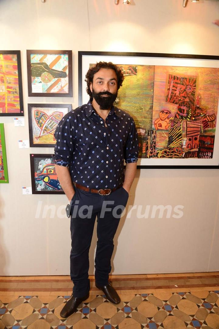 Bobby Deol poses for the media at The Gateway Schools Annual Art Show