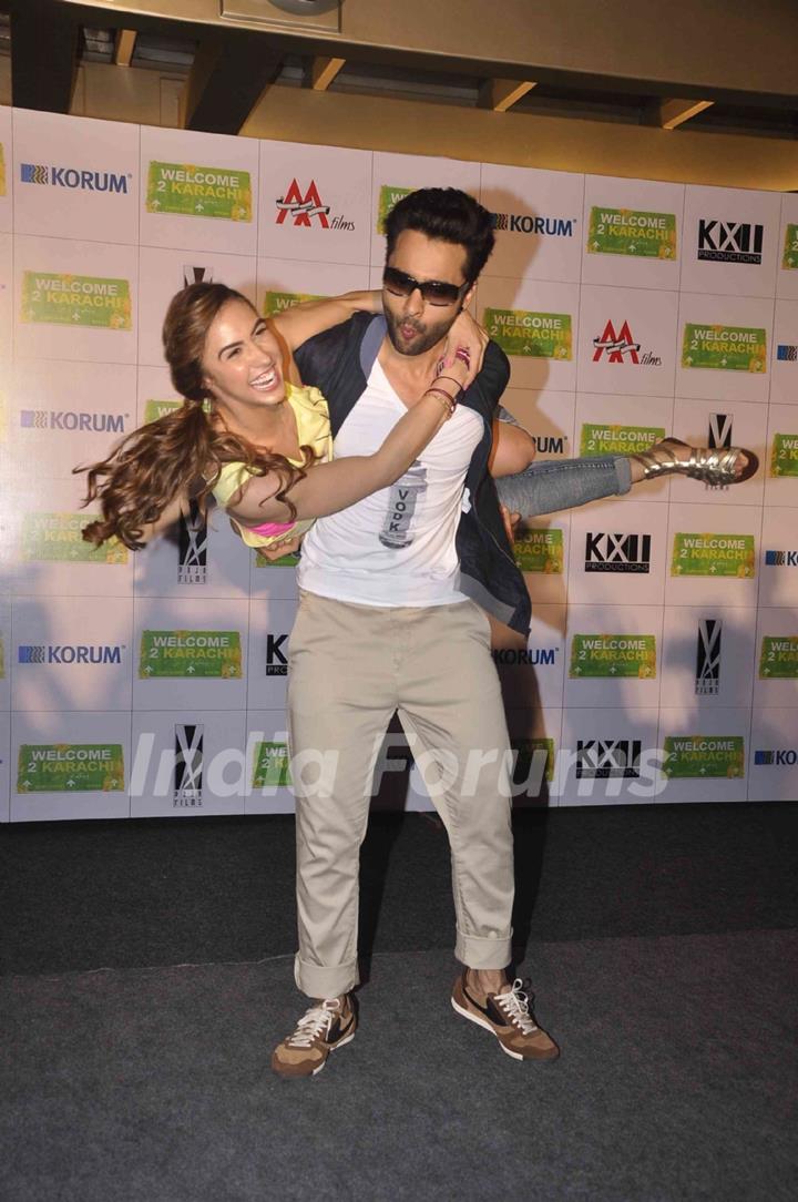 Jackky Bhagnani lifts Lauren Gottlieb during the Promotions of Welcome To Karachi at Korum Mall